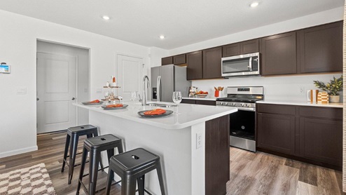 Colonial heights Bellamy model home kitchen with LVP flooring