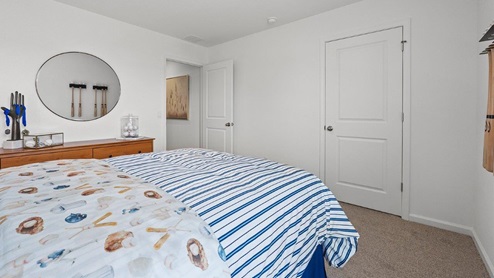 Colonial Heights Bellamy model home bedroom 2 with closet