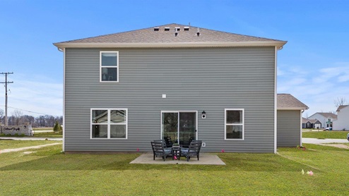 Colonial Heights Bellamy model home rear exterior with patio