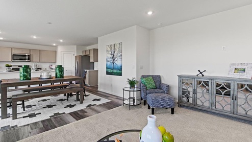Livingston Lakes Holcombe model home open floor plan living room and dining room