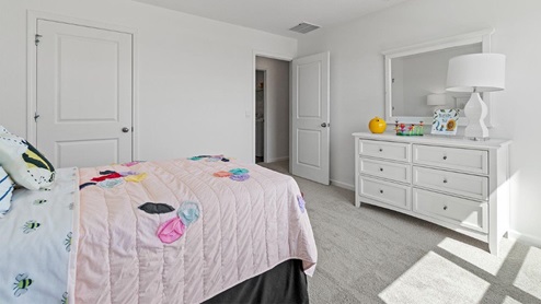 Livingston Lakes Holcombe model home bedroom 3 with closet space