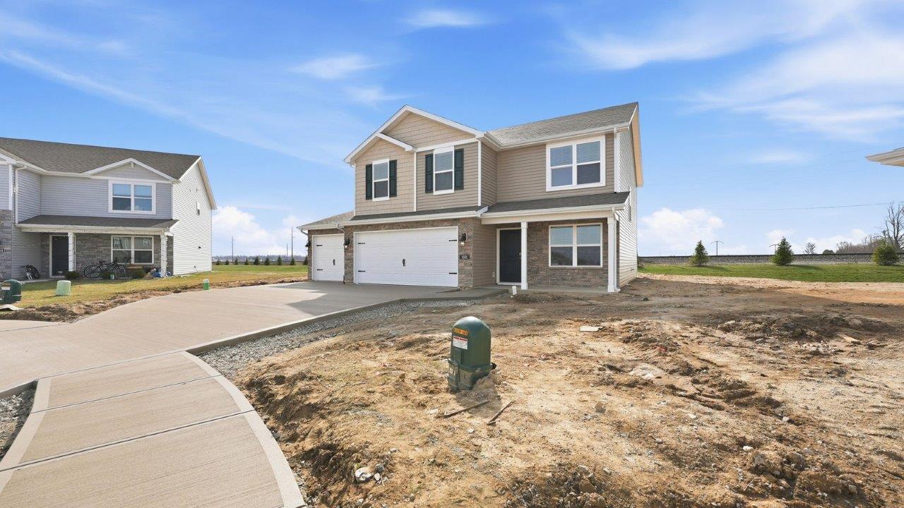 livingston lakes bellamy exterior with 3 car garage, culdesac homesite, covered front porch