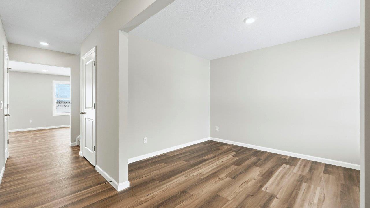foyer leading to study and main living space with mohawk eastmont lvp flooring