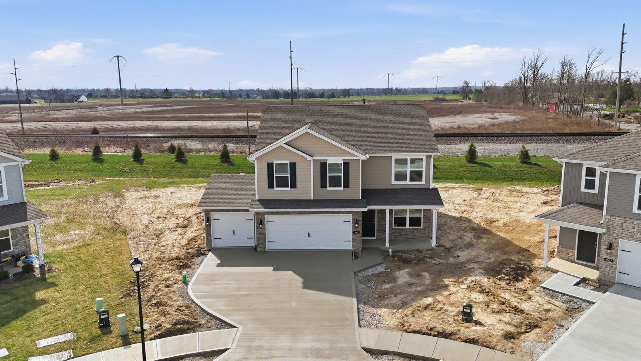 livingston lakes bellamy exterior with 3 car garage, culdesac homesite, covered front porch