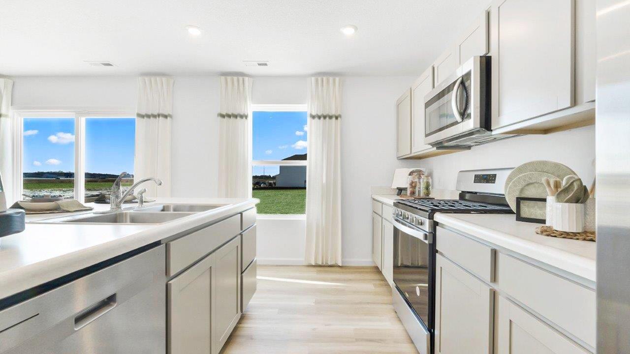 bellamy kitchen with center island with bar seating