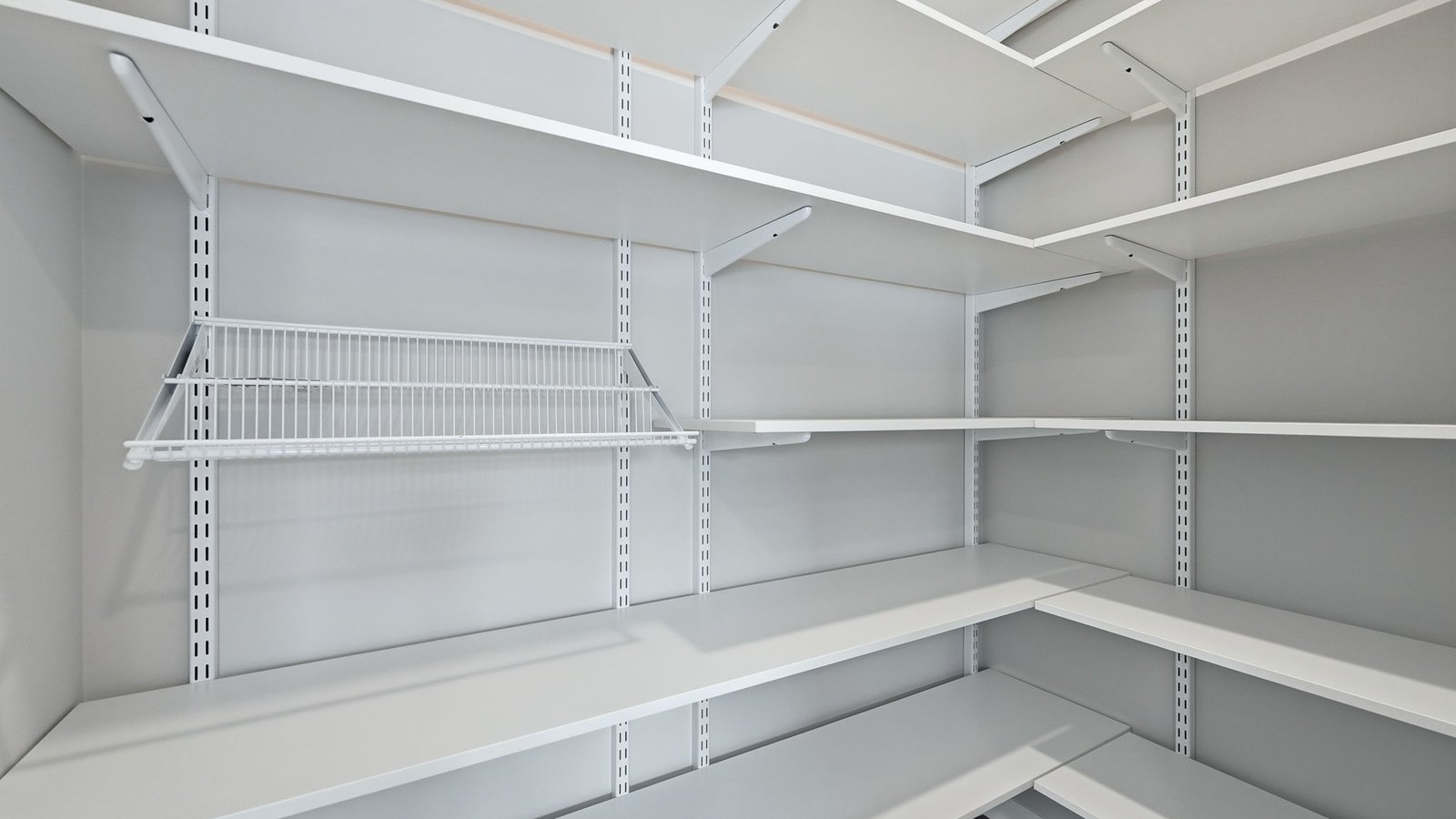 kitchen pantry with built-in freedom rail shelving