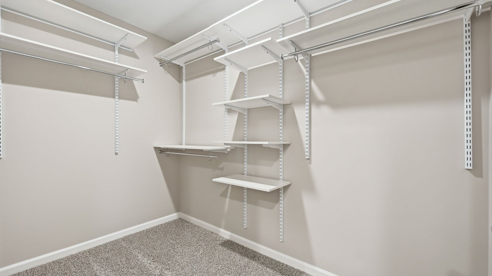 primary ensuite walk-in closet with shelving