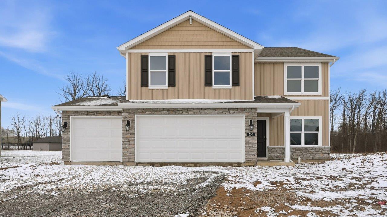 the haven bellamy exterior with 3 car garage and spacious yard