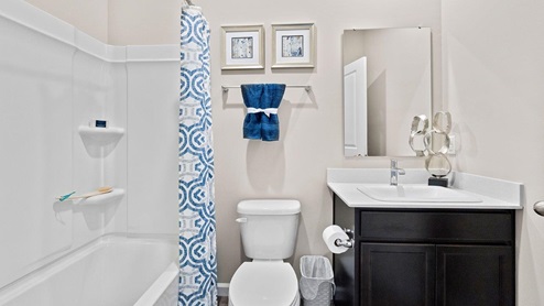 marcella model home bathroom with tub shower
