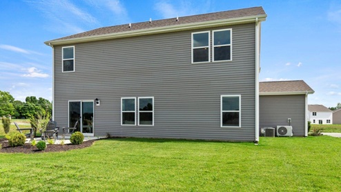 Marcella Henley - rear exterior with patio and large sodded yard space