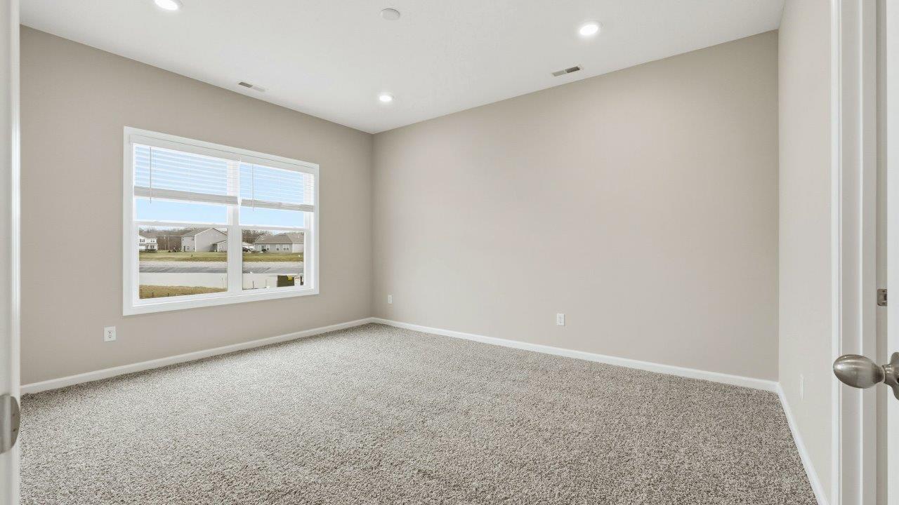 marcella chatham primary bedroom with ensuite bath and closet