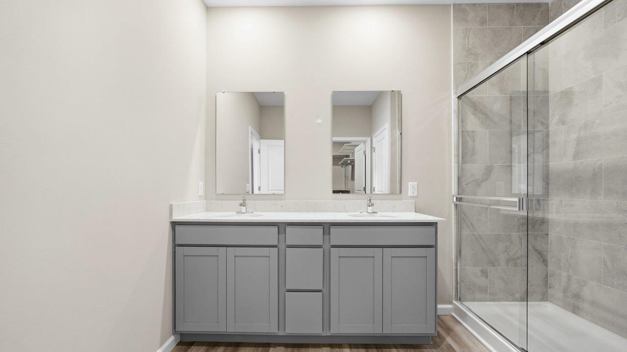 marcella chatham primary bedroom with ensuite bath and closet