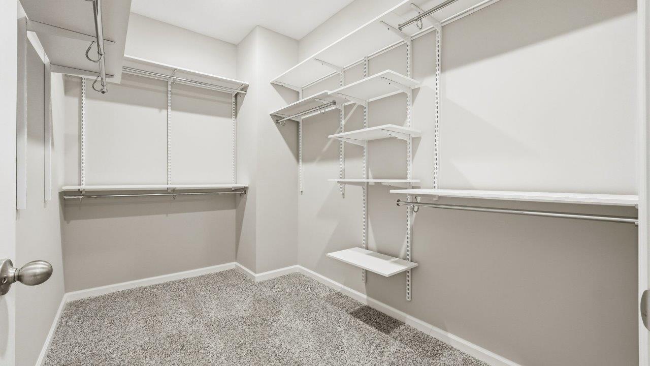 marcella chatham primary bedroom with ensuite bath and closet