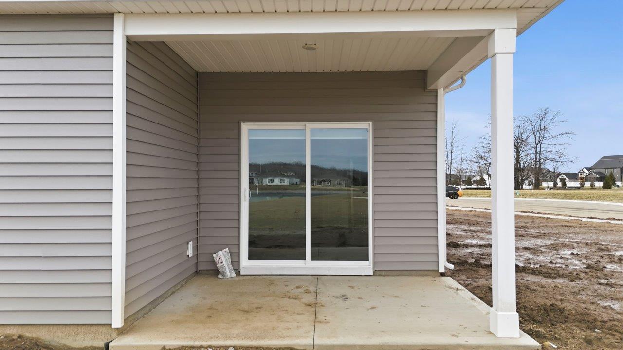 marcella chatham rear exterior with covered patio