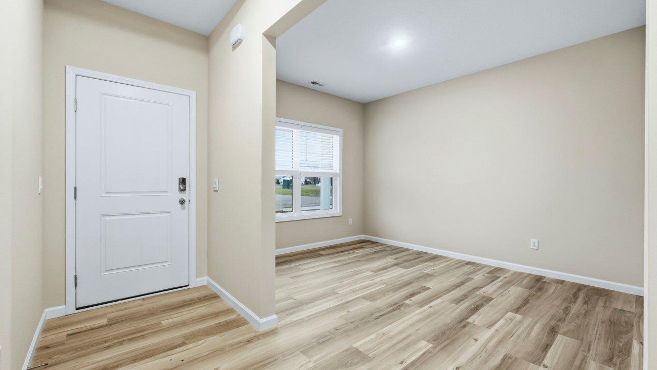 first floor stody, front door, and foyer