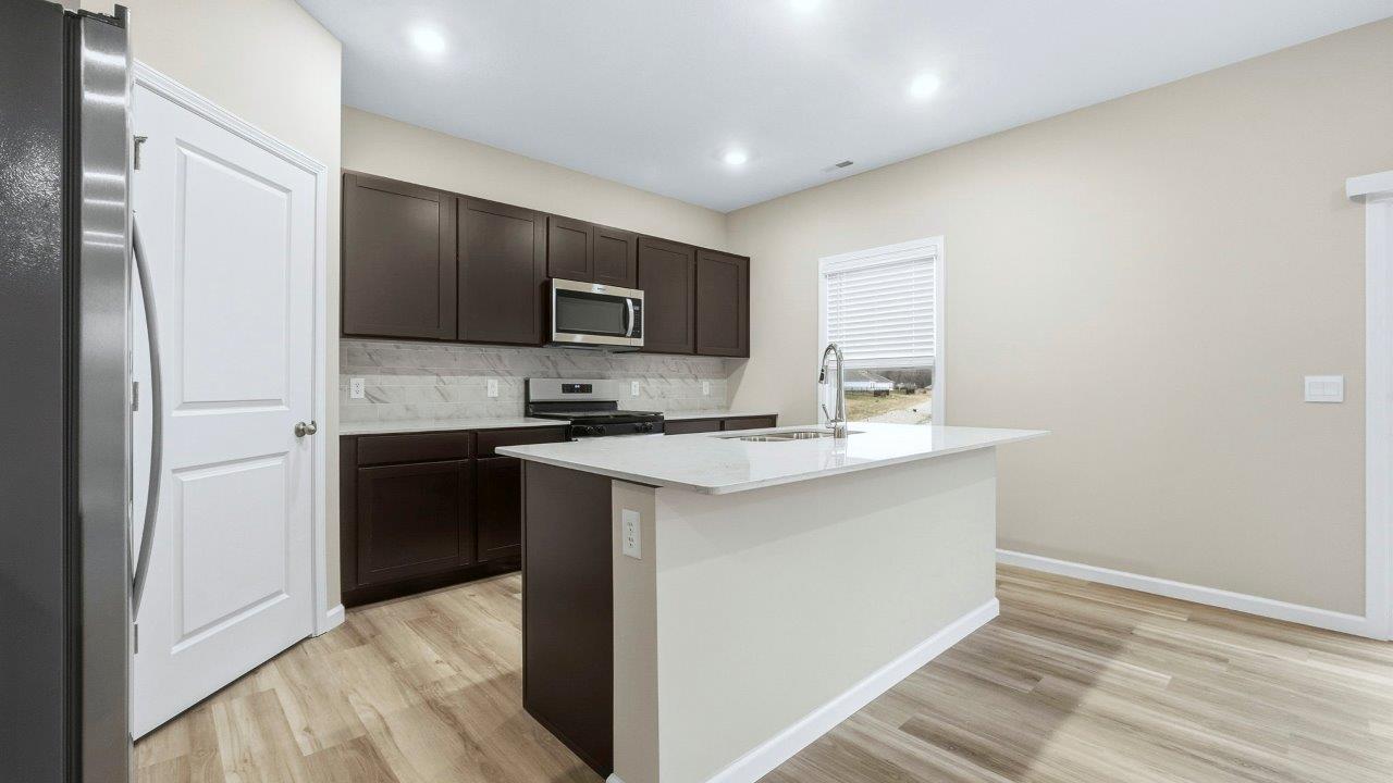 kitchen with sarsaparilla cabinets