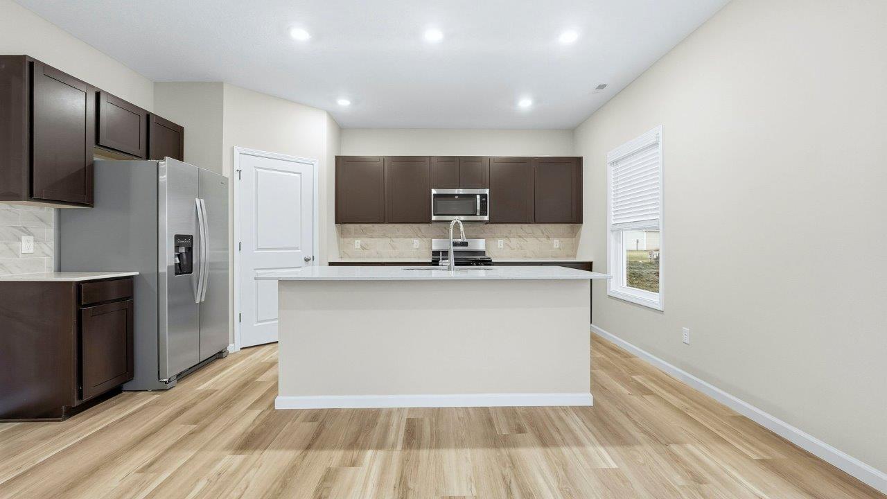 kitchen with sarsaparilla cabinets