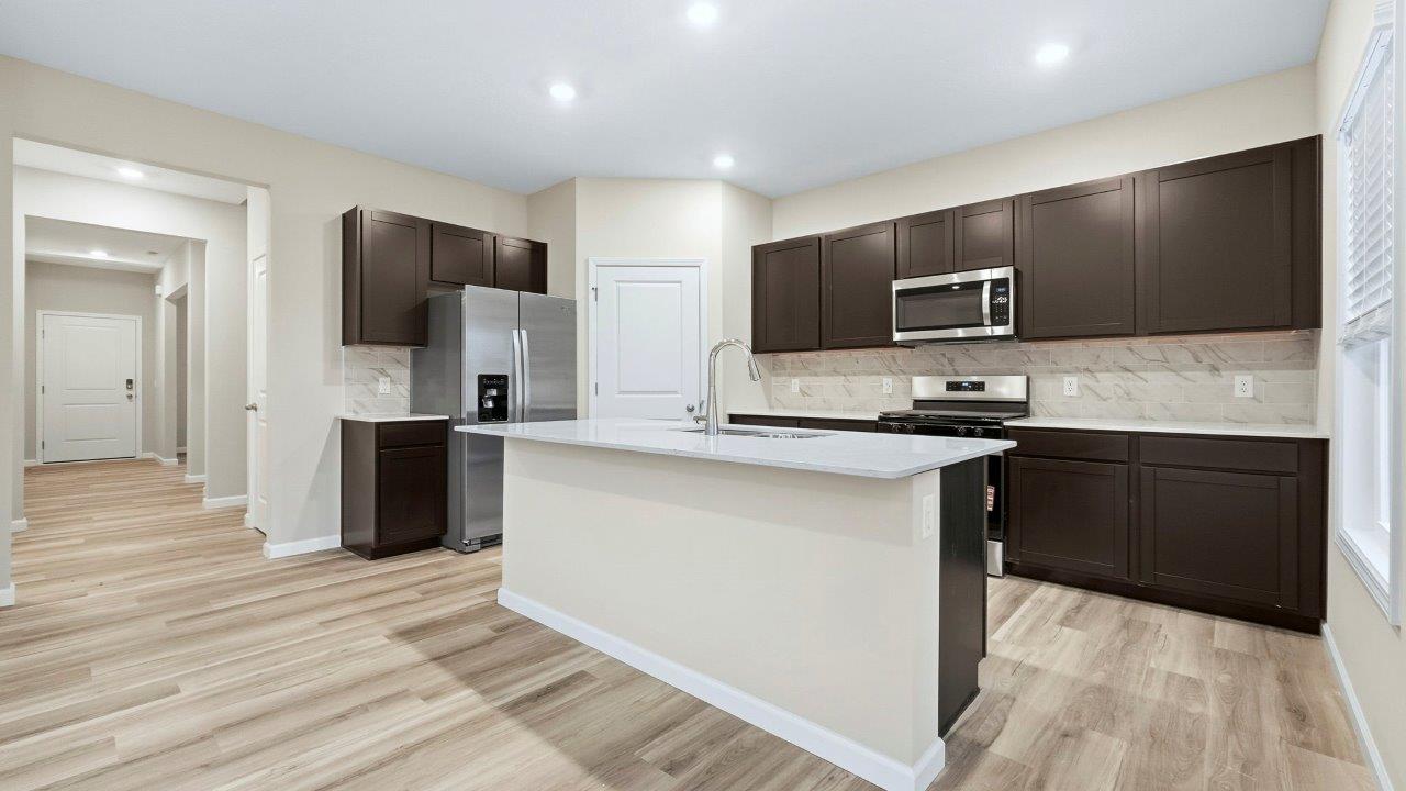 kitchen with sarsaparilla cabinets