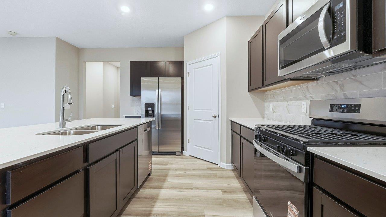 kitchen with sarsaparilla cabinets