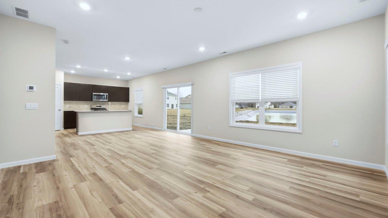 kitchen, dining, and living rooms