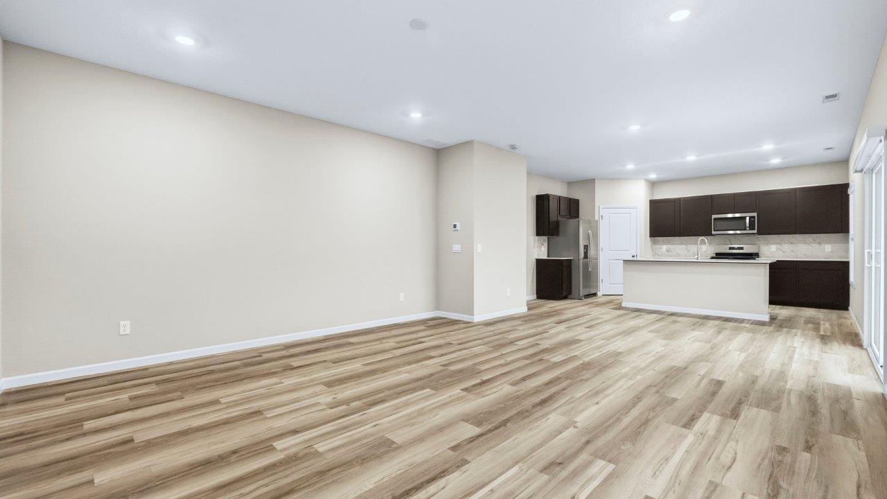 kitchen, dining, and living rooms