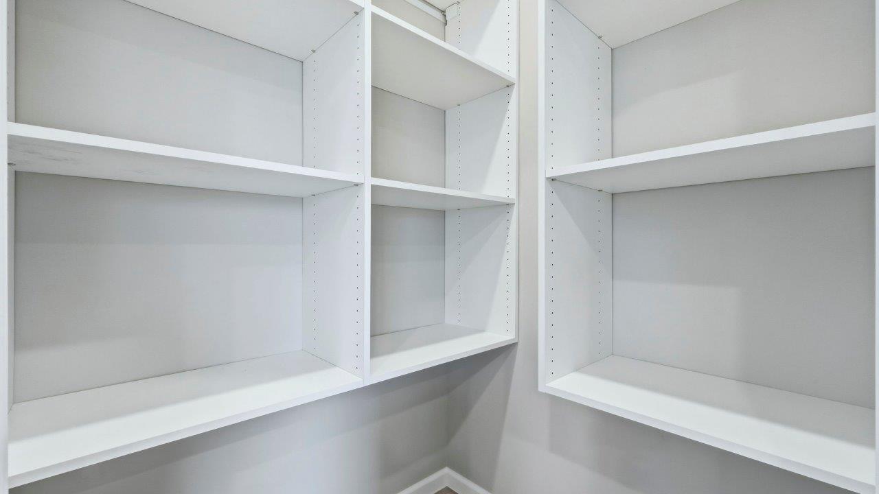 corner pantry with shelving