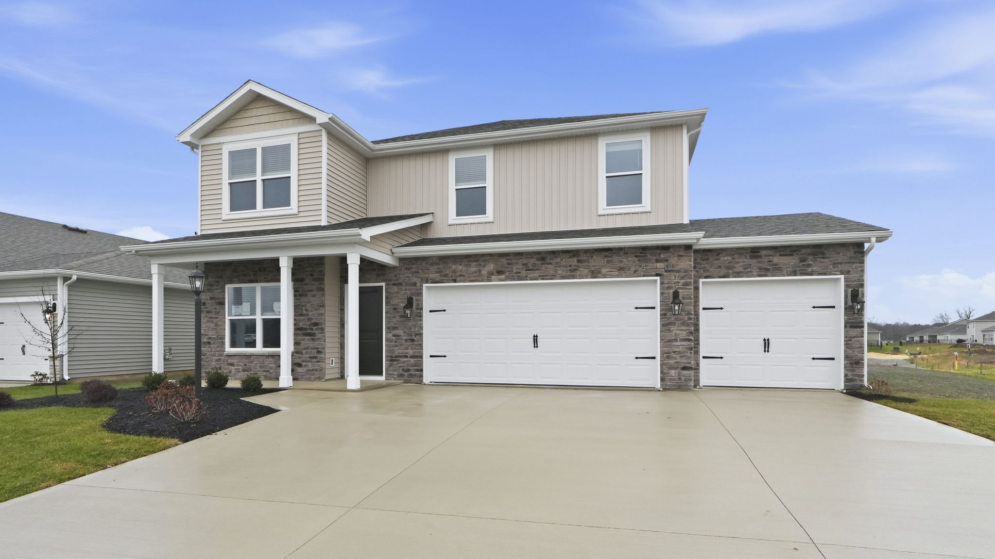 marcella stamford 2 story home with 3 car garage, sodded, landscaped