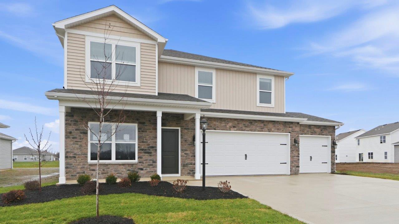 marcella stamford 2 story home with 3 car garage, sodded, landscaped