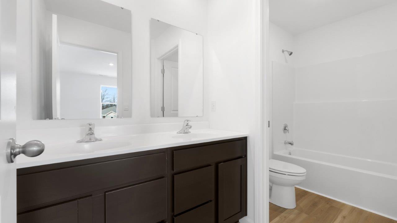 stamford full bath with dual sinks and private water room