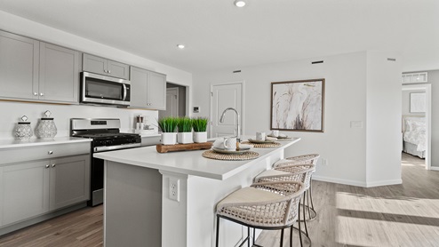Estates at Signal Ridge Chatham model kitchen with large island with room for seating