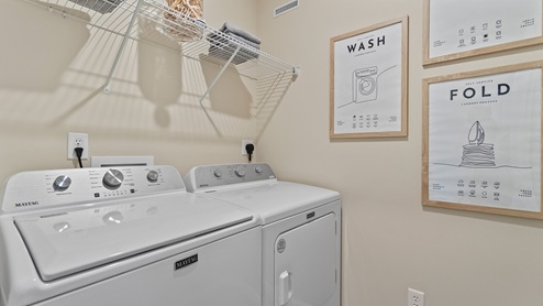 Chatham model laundry room with shelving