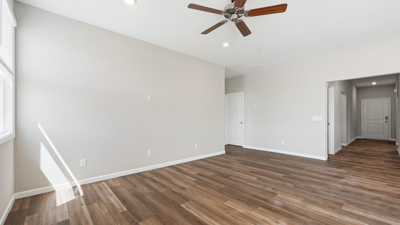 estates at signal ridge harmony villa living room with lvp flooring and open layout