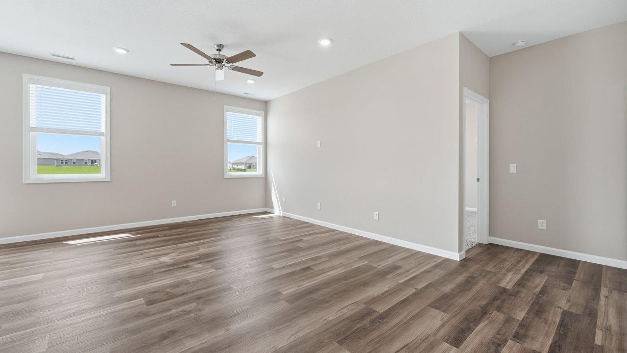 estates at signal ridge harmony villa living room with lvp flooring and open layout