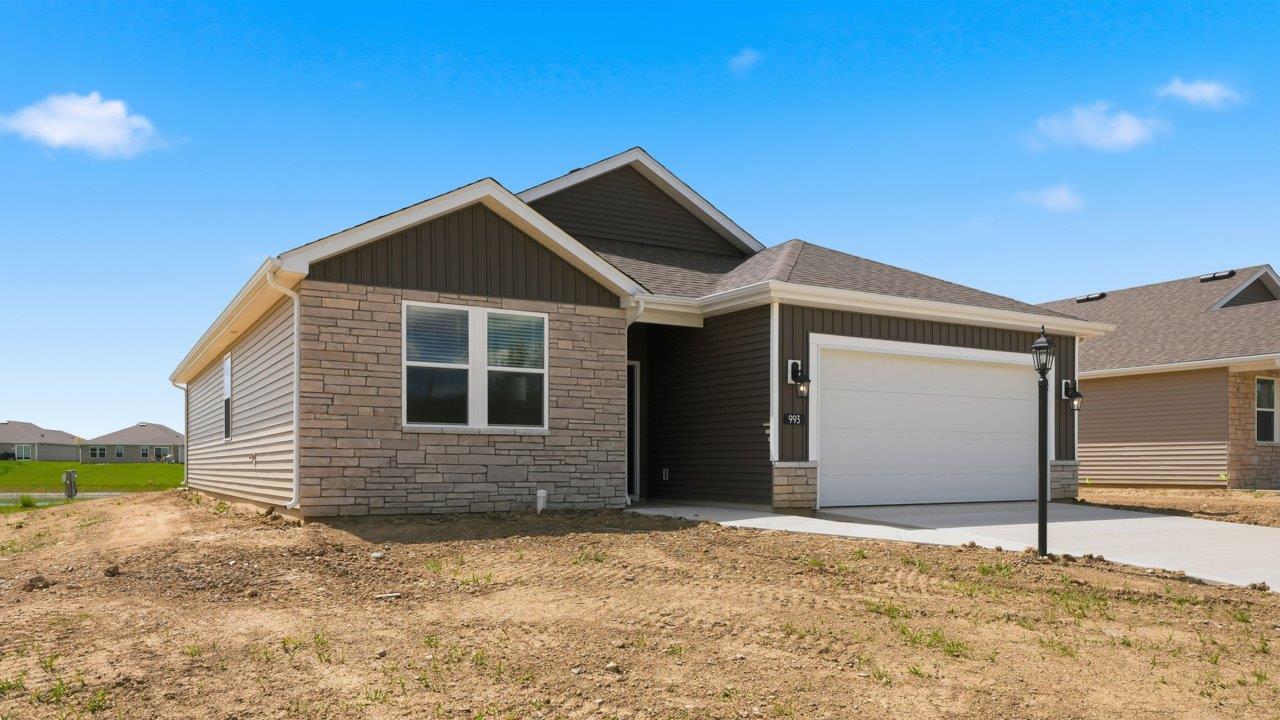 estates at signal ridge harmony villa with 2 car garage and pond homesite