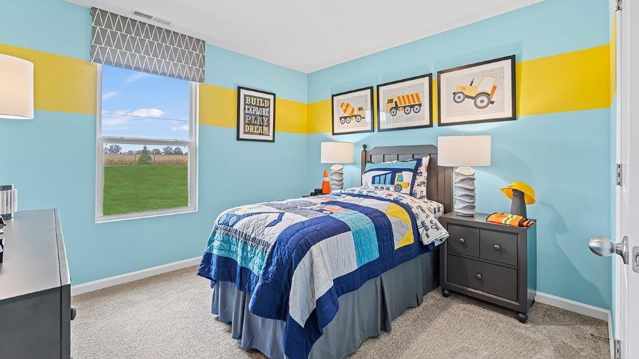 bedroom 3 with 1 window, carpet, blue walls, and closet