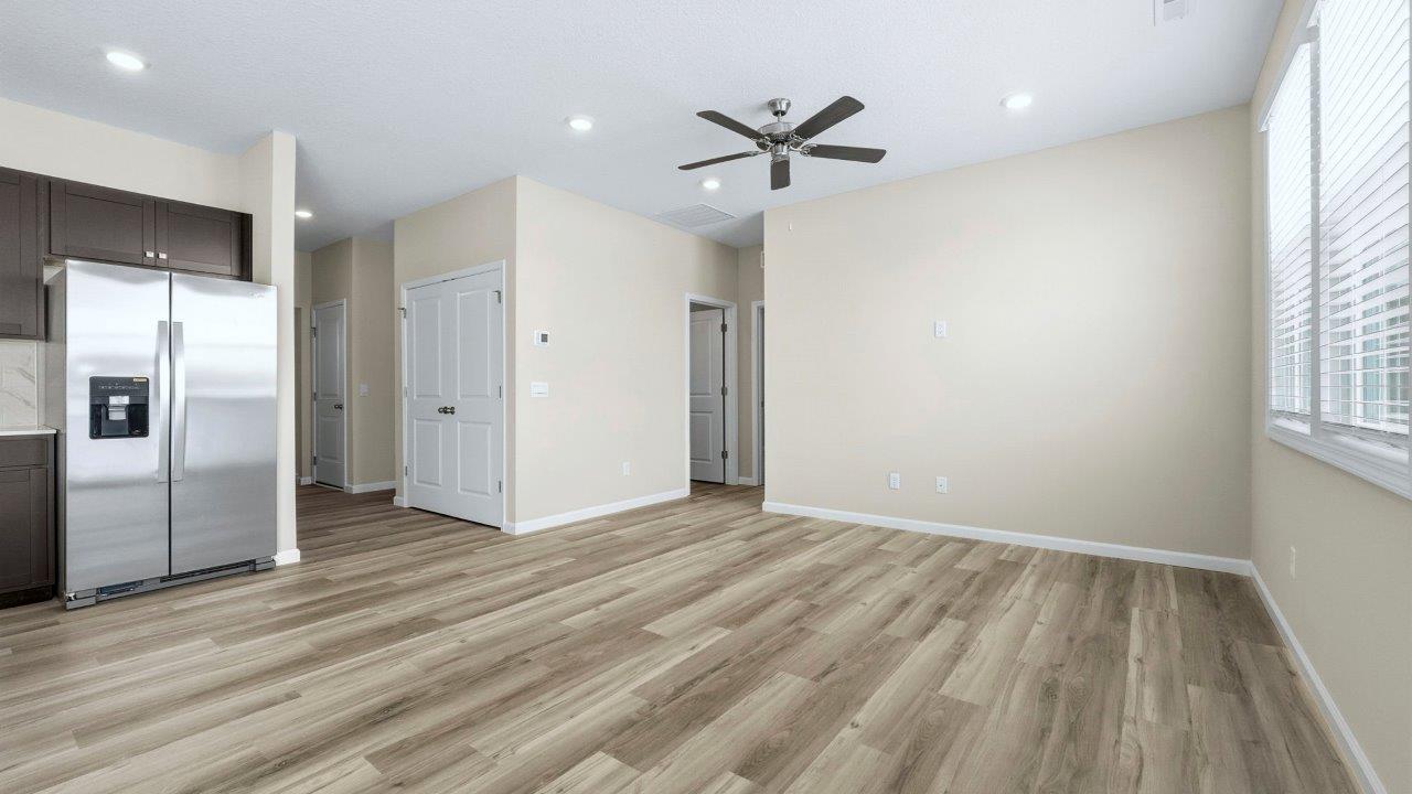 living room open layout with lvp flooring
