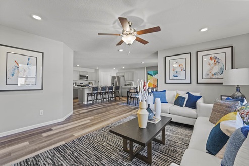 Timber Creek Chatham Model Home - Living room with Draven LVP flooring.