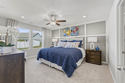 Timber Creek Chatham Model Home - Main Bedroom with 2 large windows and 52" ceiling fan.