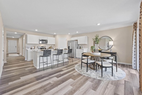 Fawn Creek Chatham Model Home dining room and kitchen