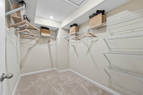 Fawn Creek Chatham Model Home walk in closet off of main bedroom