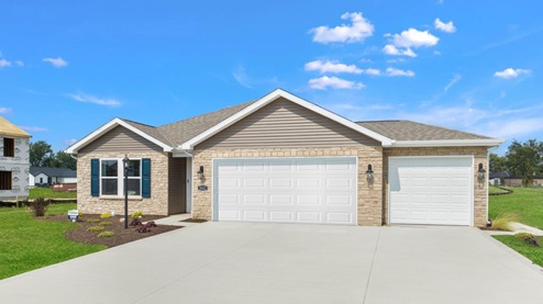 fawn creek estates model home exterior with 3-car garage