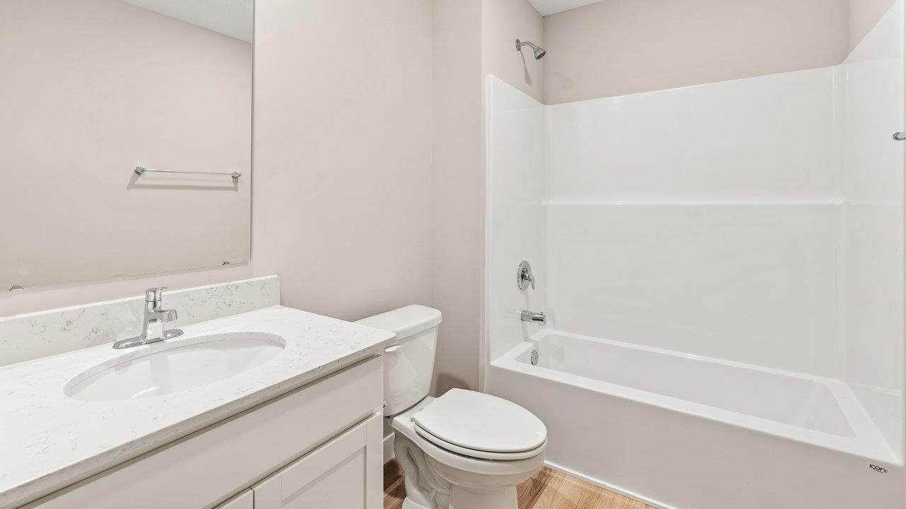 fawn creek estates freeport - full bathroom with tub shower and single sink vanity