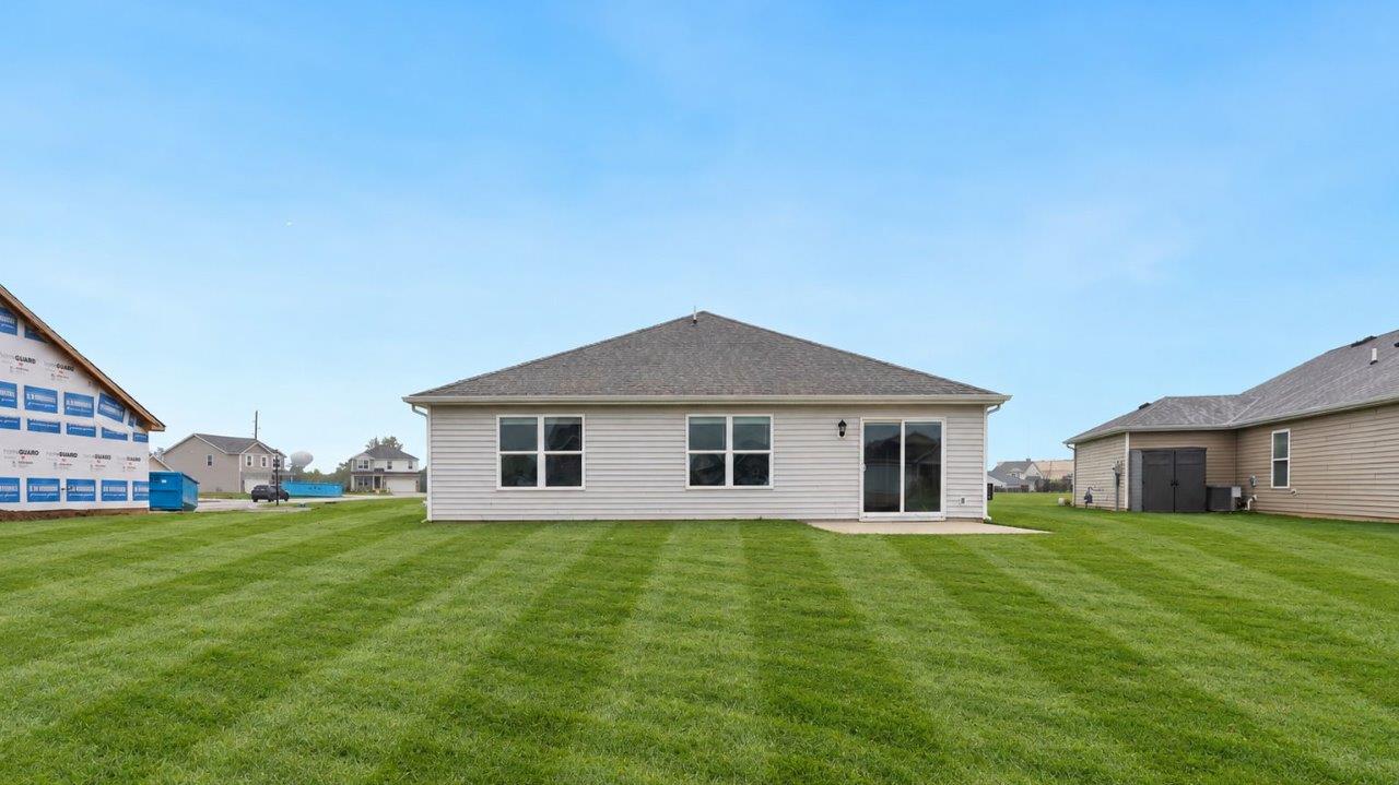 fawn creek estates freeport - exterior with concrete patio to be sodded