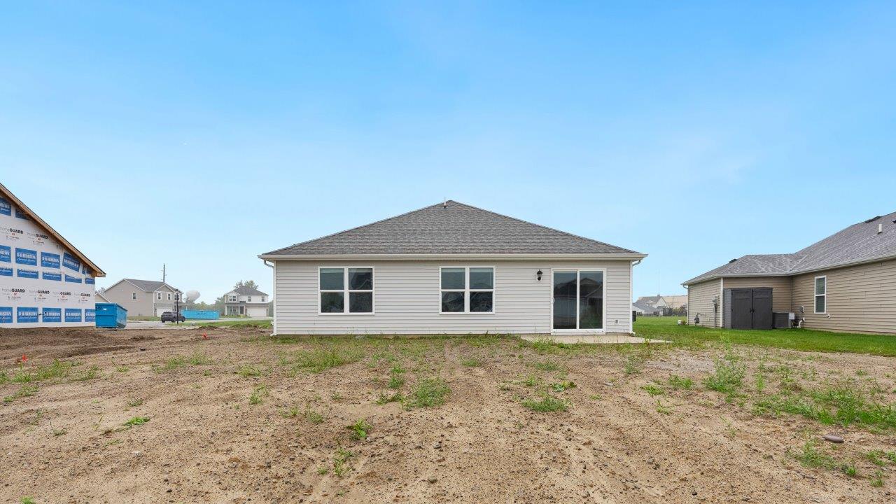 fawn creek estates freeport - exterior with concrete patio to be sodded