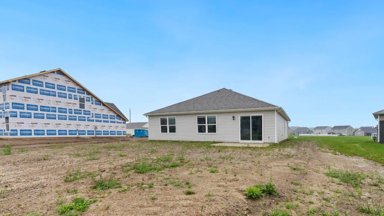 fawn creek estates freeport - exterior with concrete patio to be sodded