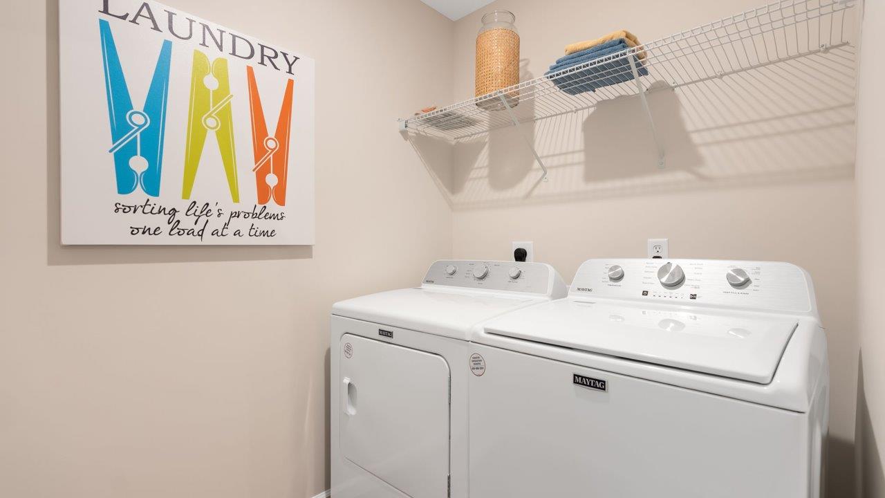 farmstead at carroll creek henley model home laundry room
