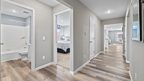 sonora chatham model home Hallway with LVP flooring from the front door