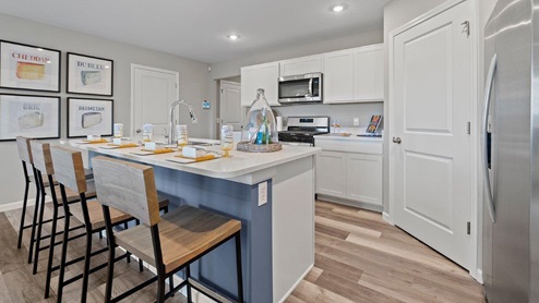 Sonora Chatham Model home kitchen with Draven LVP flooring
