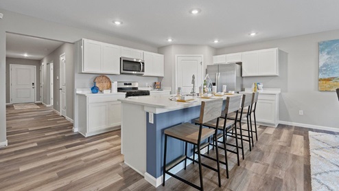 Sonora Chatham Model home kitchen with large island with room for seating