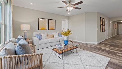 sonora chatham model home Living room with 52 inch ceiling fan